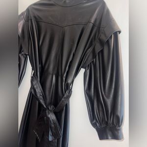 Black leather knee high dress. Size 10, worn once.